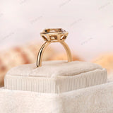 Modern bezel engagement ring oval champagne moissanite