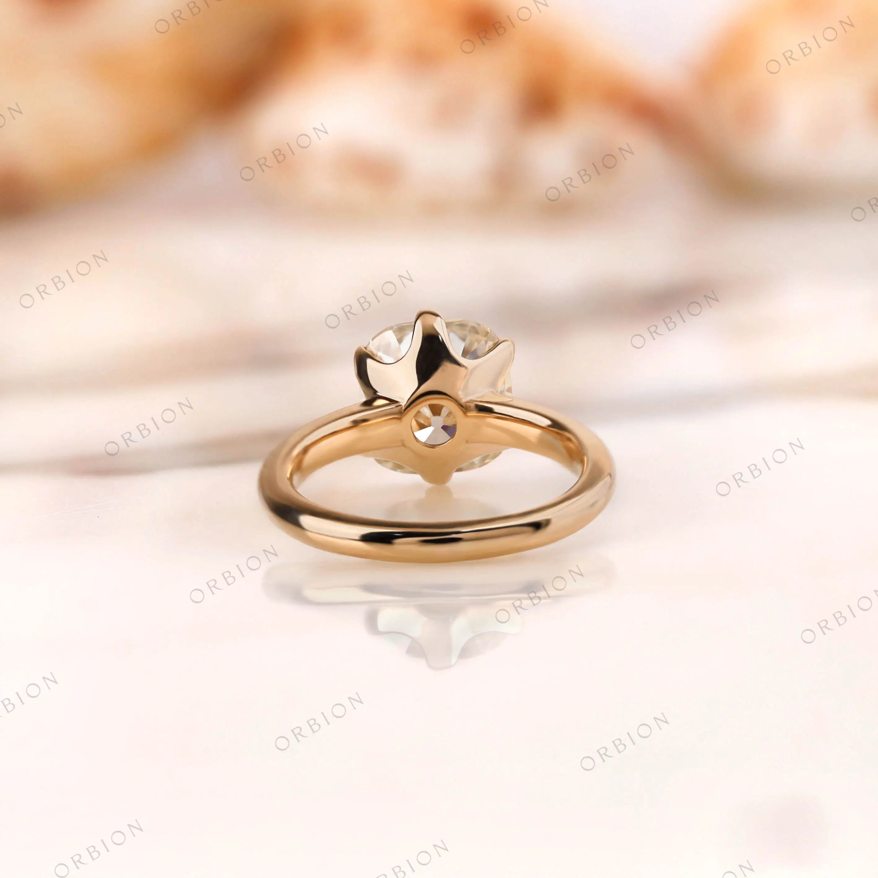 Back view showing prong structure and 14K yellow gold band