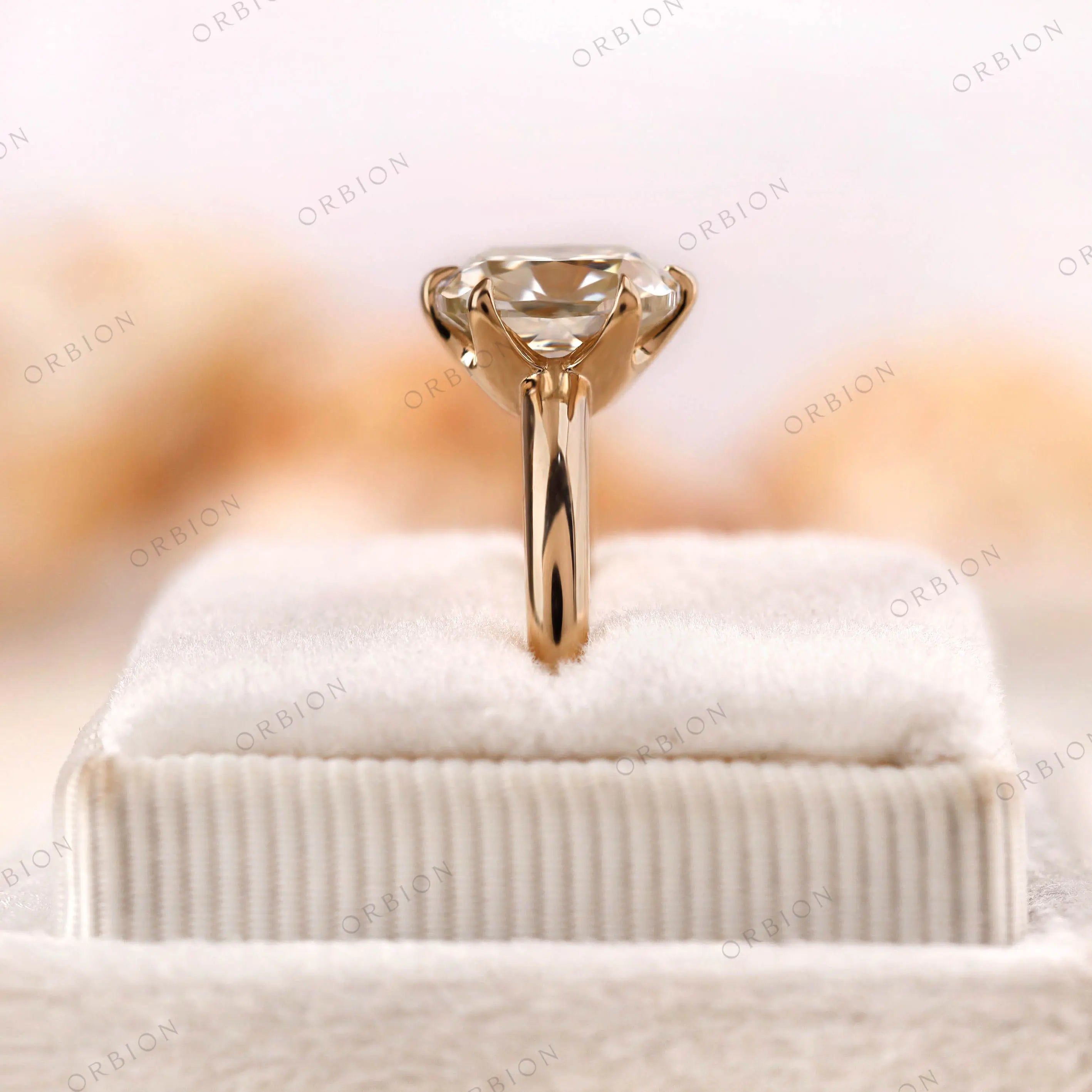 Profile view highlighting band thickness and prong setting
