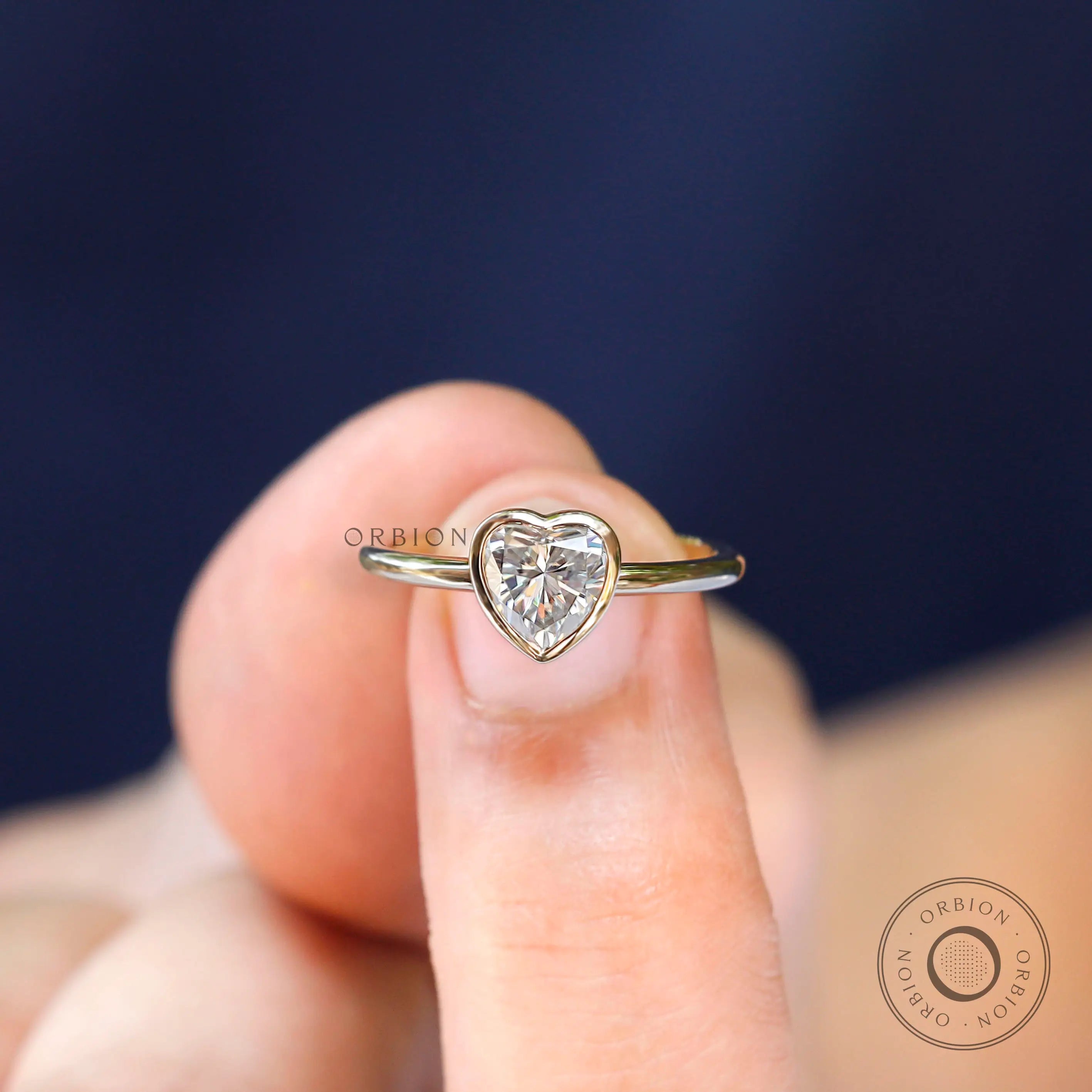 Closed bezel heart solitaire ring yellow gold