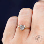 Brilliant cut heart moissanite ring close-up
