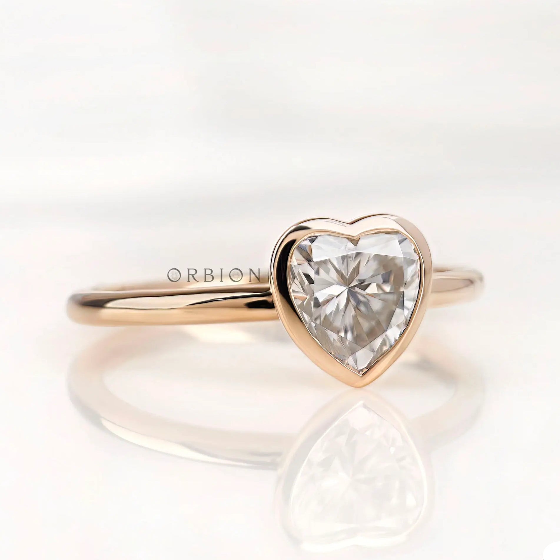Heart cut moissanite ring closed bezel setting