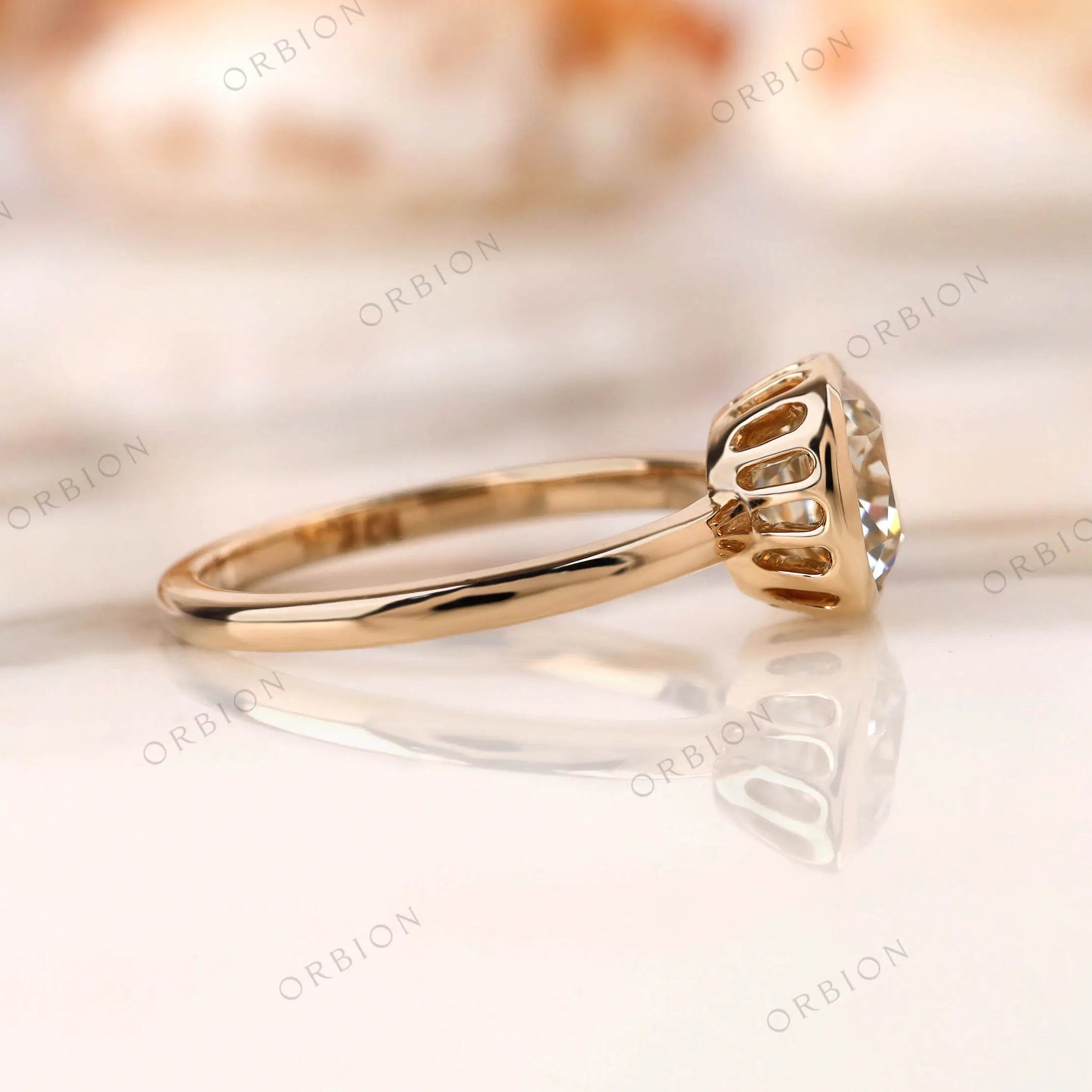 Side view of Old Mine Cut moissanite bezel ring