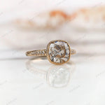 Close-up of the bezel set band and setting of Moissanite Engagement Ring in 14K Yellow Gold