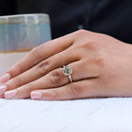 Another angle of Bezel Set Cushion Cut Moissanite Engagement Ring on a hand model with a polished finish