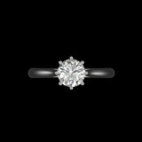 Round moissanite solitaire ring top view with eight prongs, white gold.