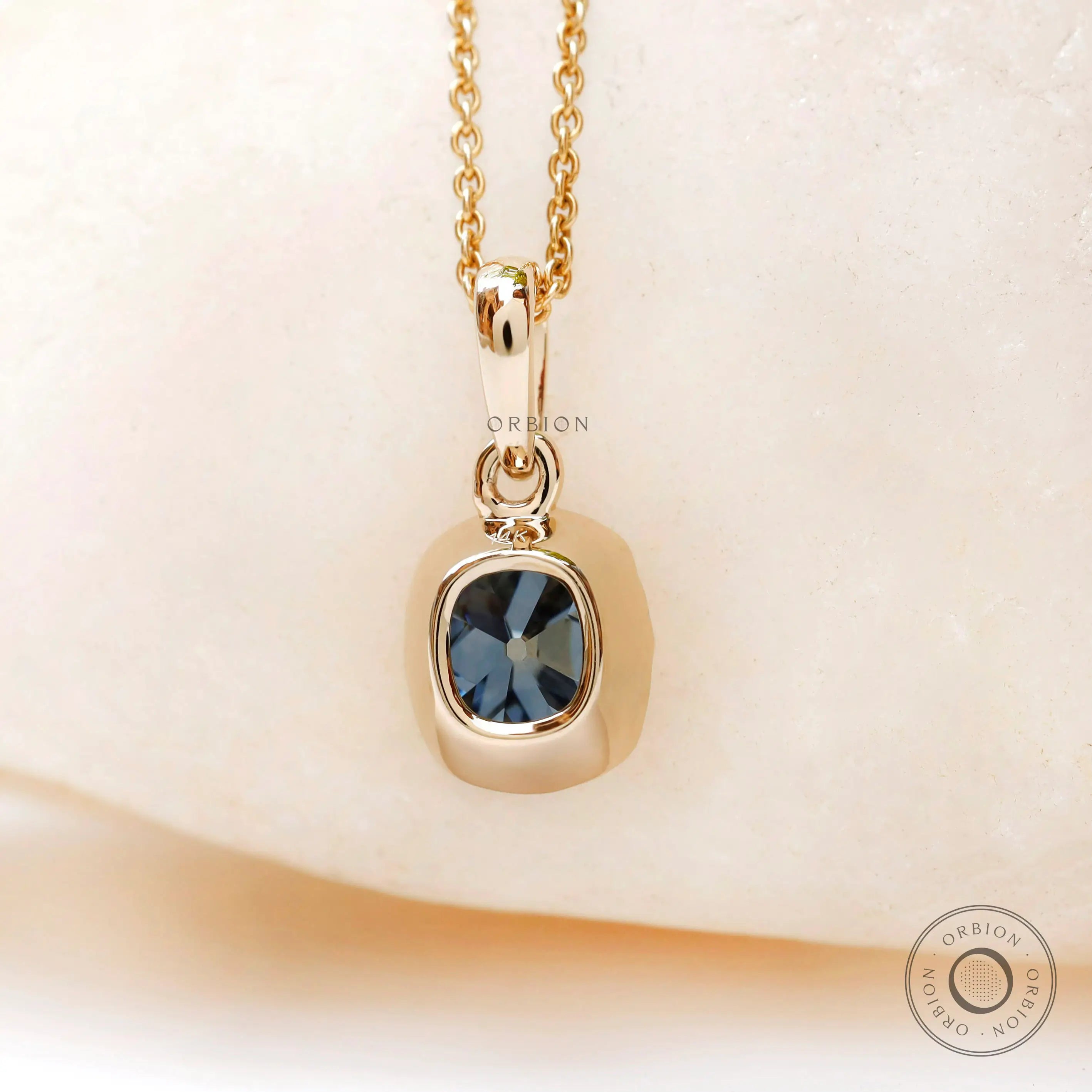 Back view yellow gold bezel moissanite pendant smooth finish