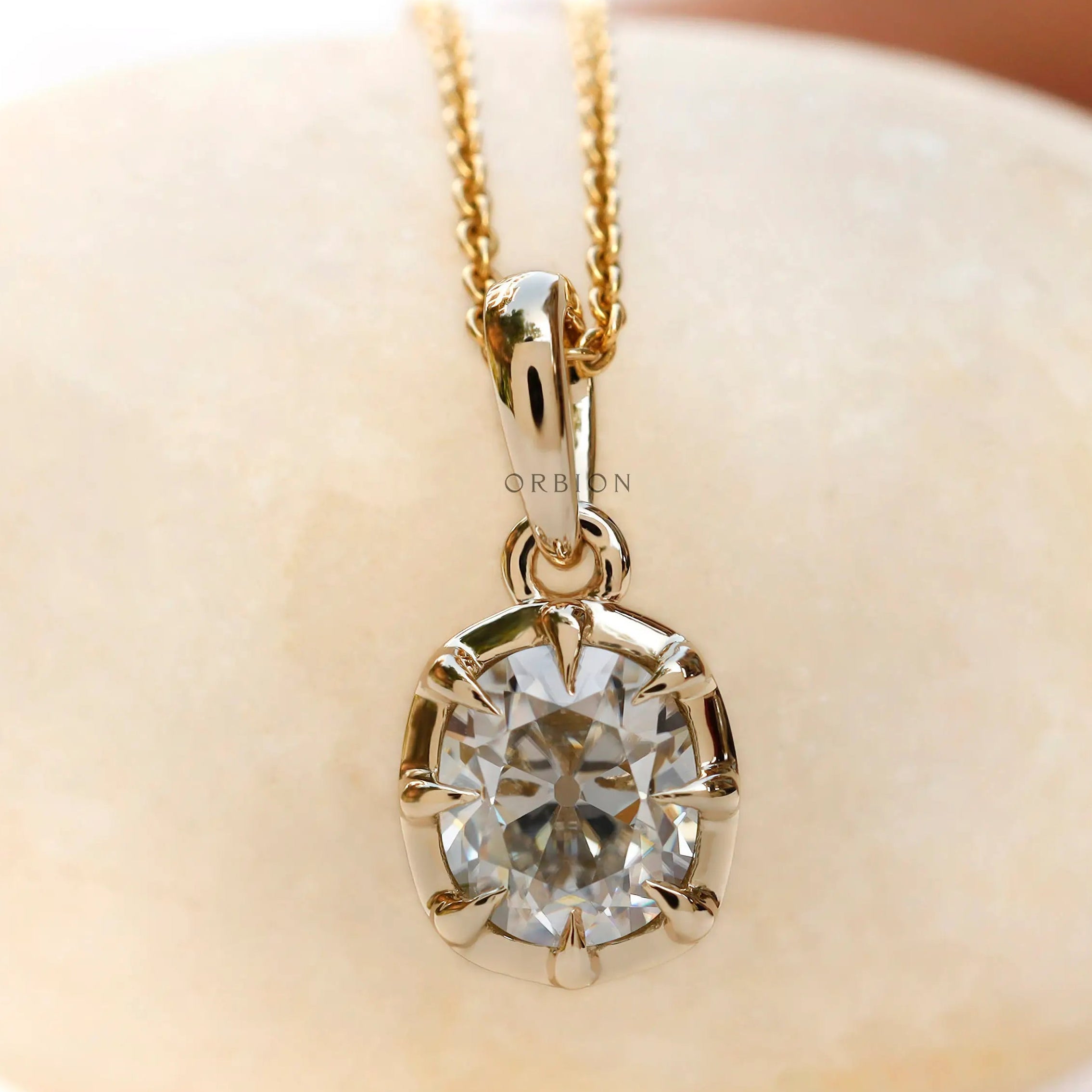 Front view old mine cut moissanite pendant yellow gold