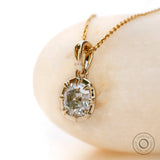 Front display old mine cut cushion moissanite pendant yellow gold