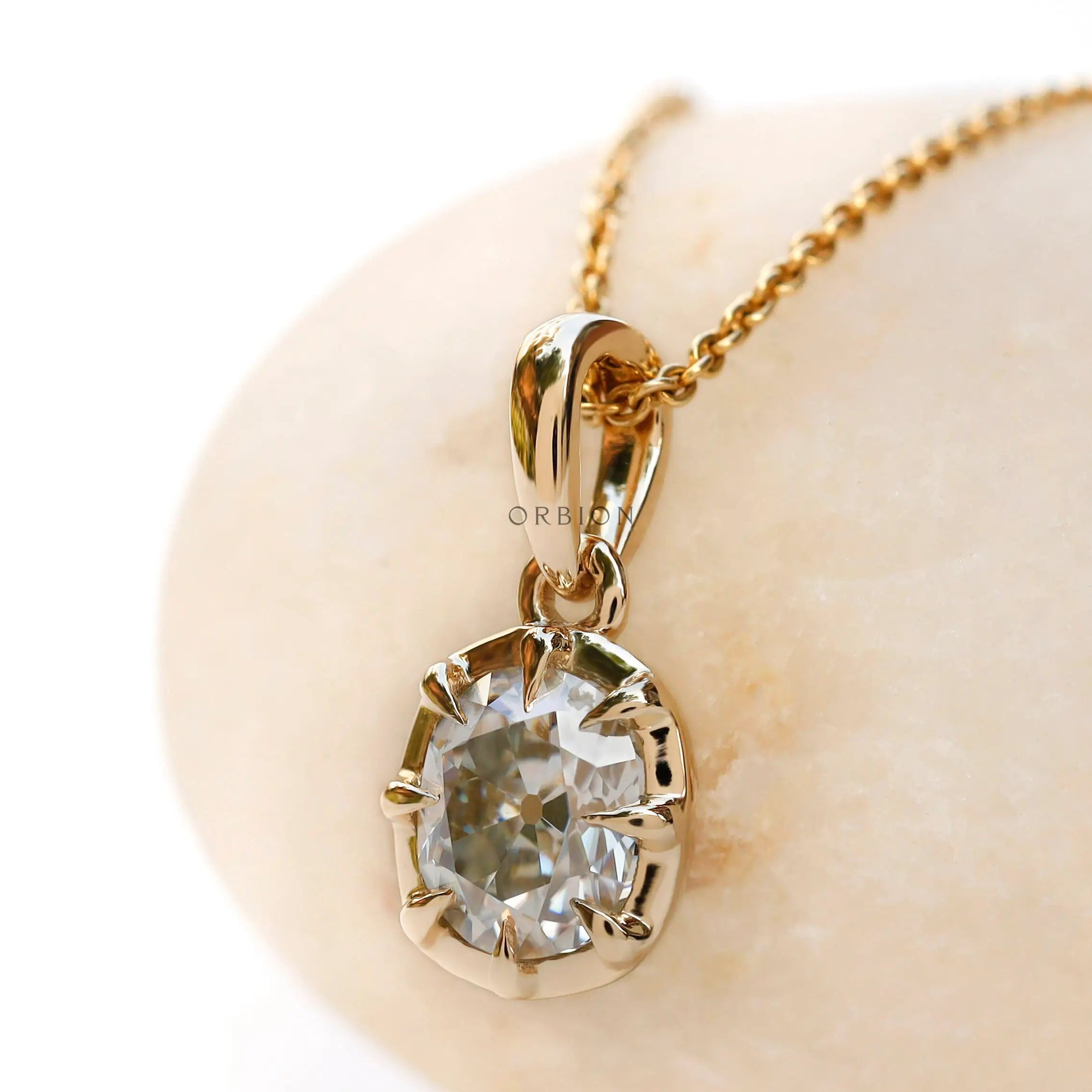 Front display old mine cut cushion moissanite pendant yellow gold