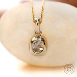 Back view yellow gold bezel moissanite pendant smooth finish