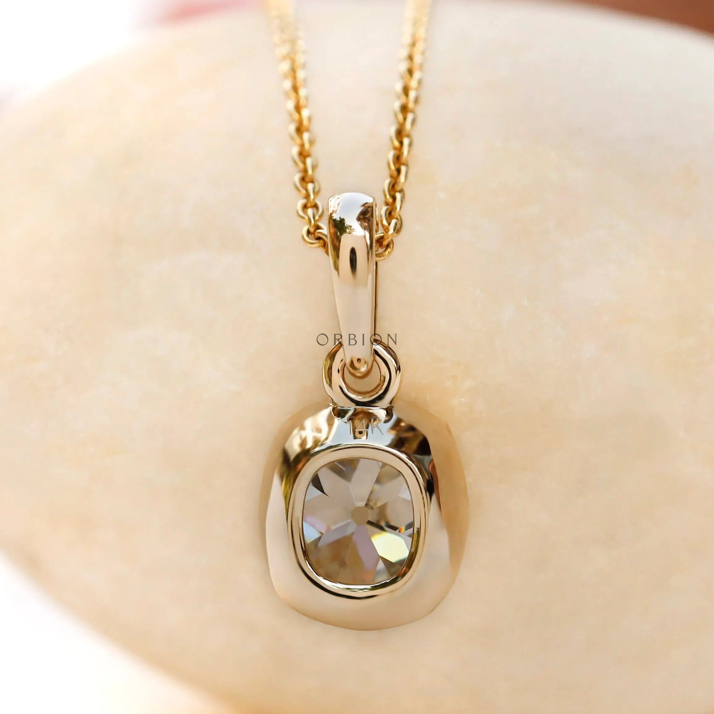 Back view yellow gold bezel moissanite pendant smooth finish