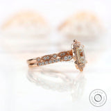 Side view of Art Deco Moissanite halo ring in rose gold