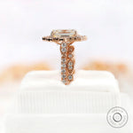 Side view of cluster ring on soft white box