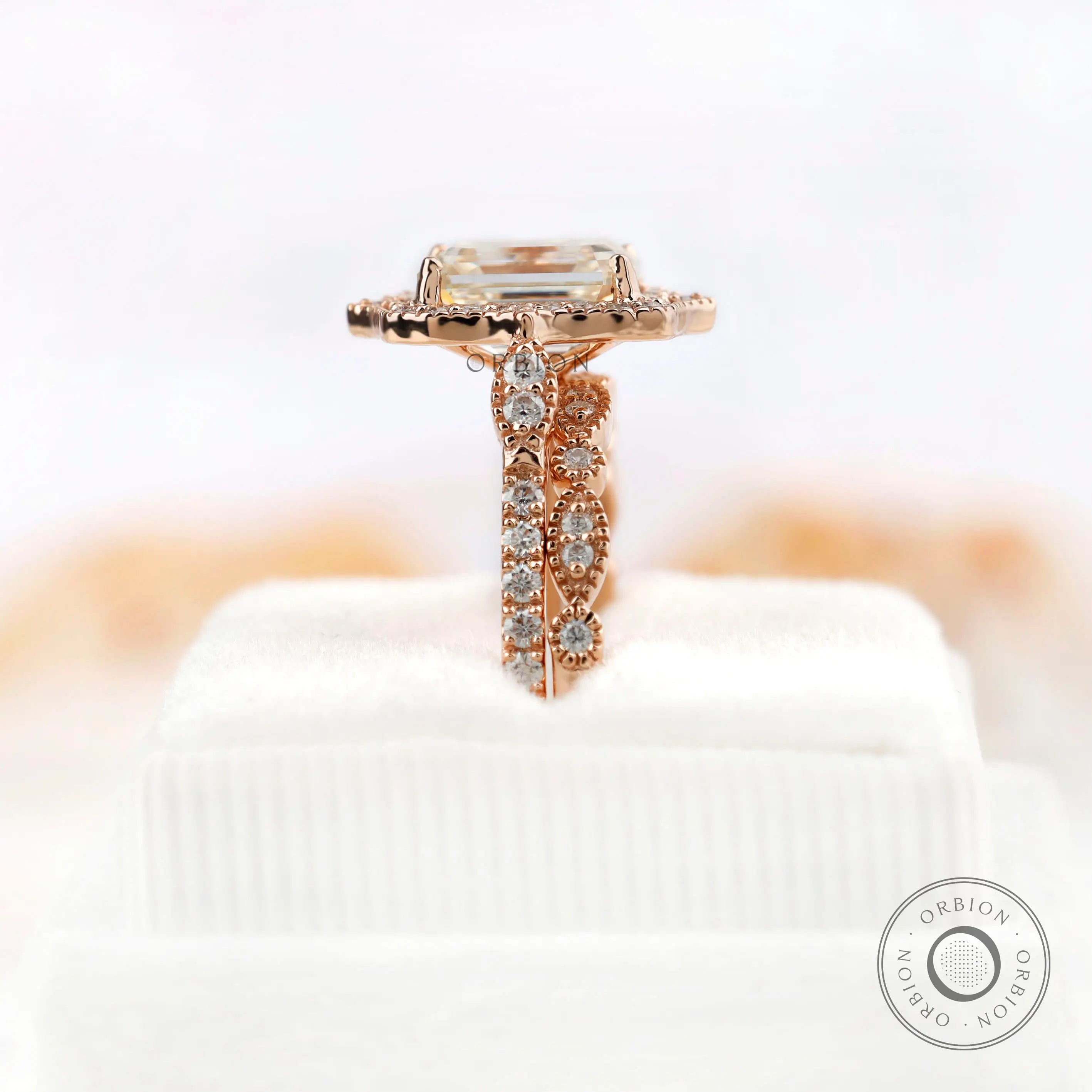 Side view of cluster ring on soft white box