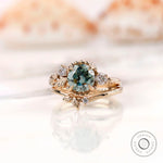 Front view nature inspired blue green moissanite ring set