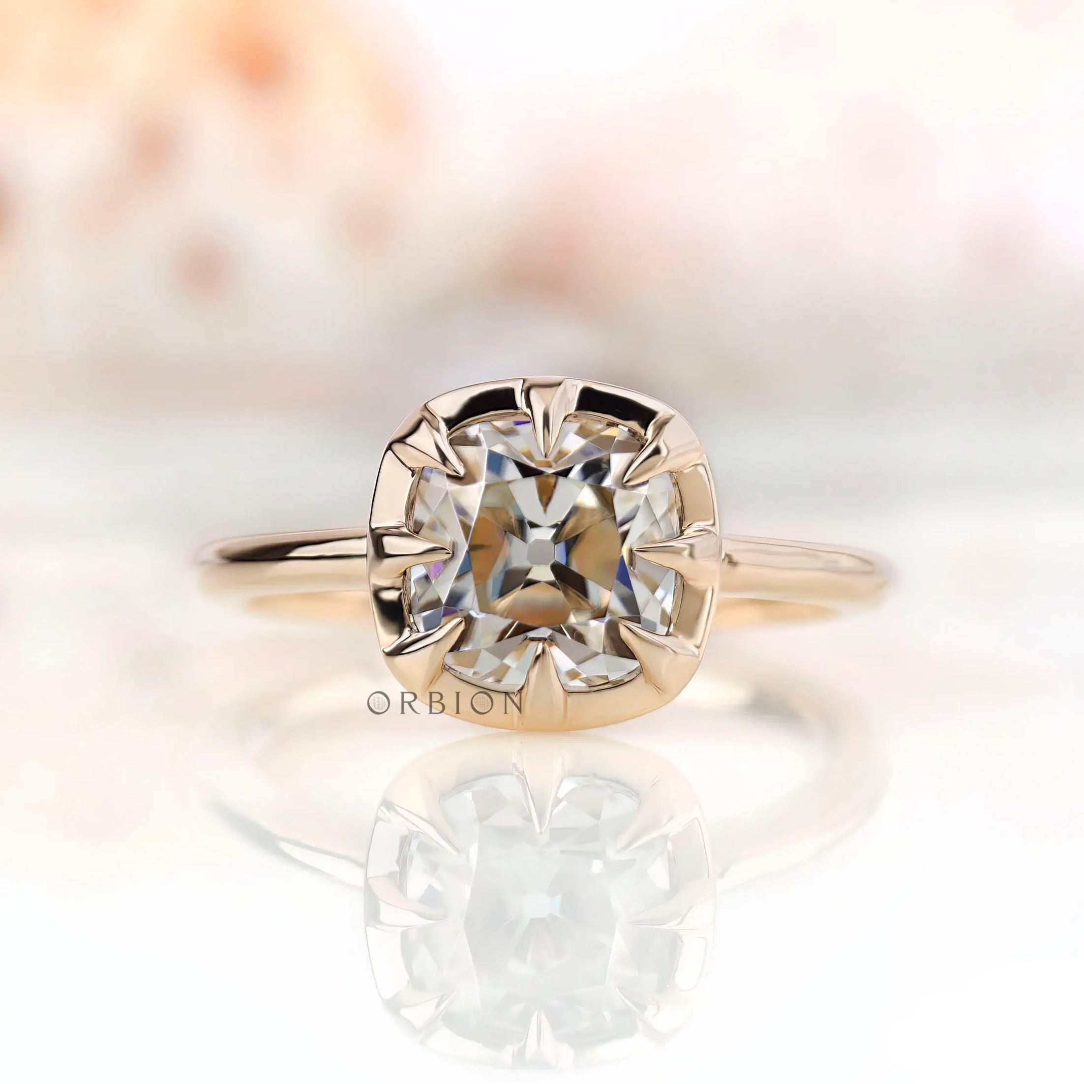 Cushion Old Mine Cut moissanite solitaire ring in yellow gold front view