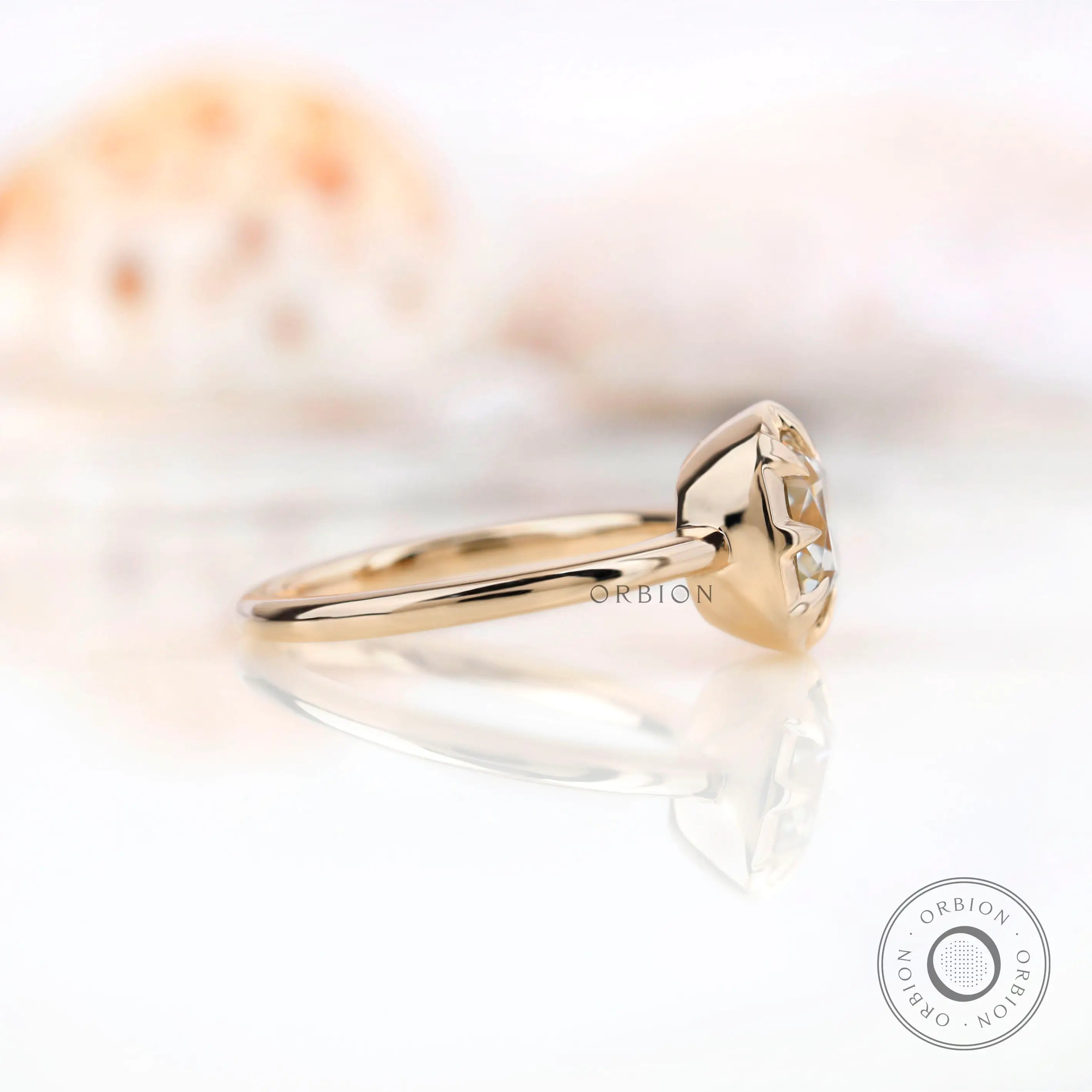 Side profile of Old Mine Cut moissanite solitaire ring