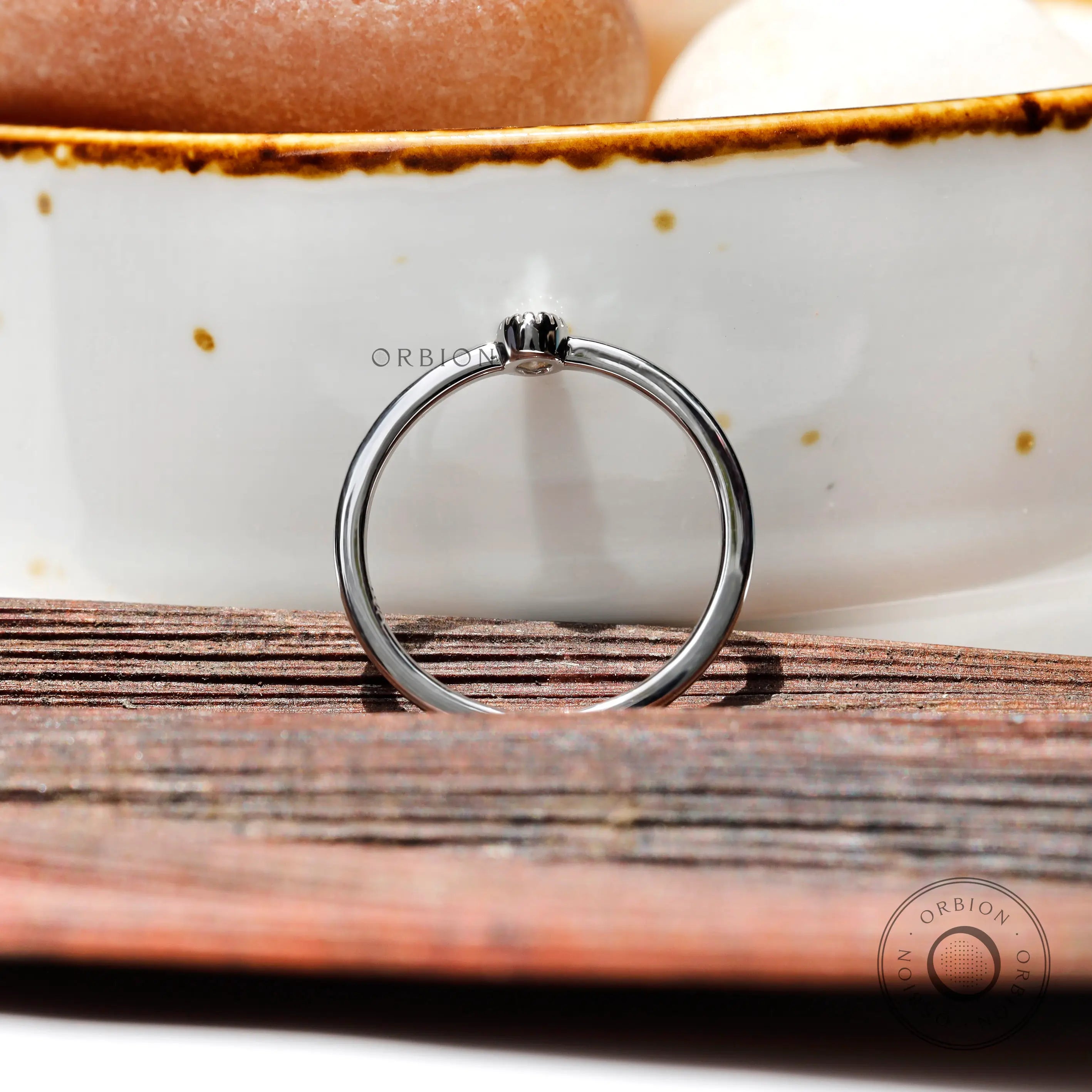 Minimalist oval ring glossy white gold finish front view