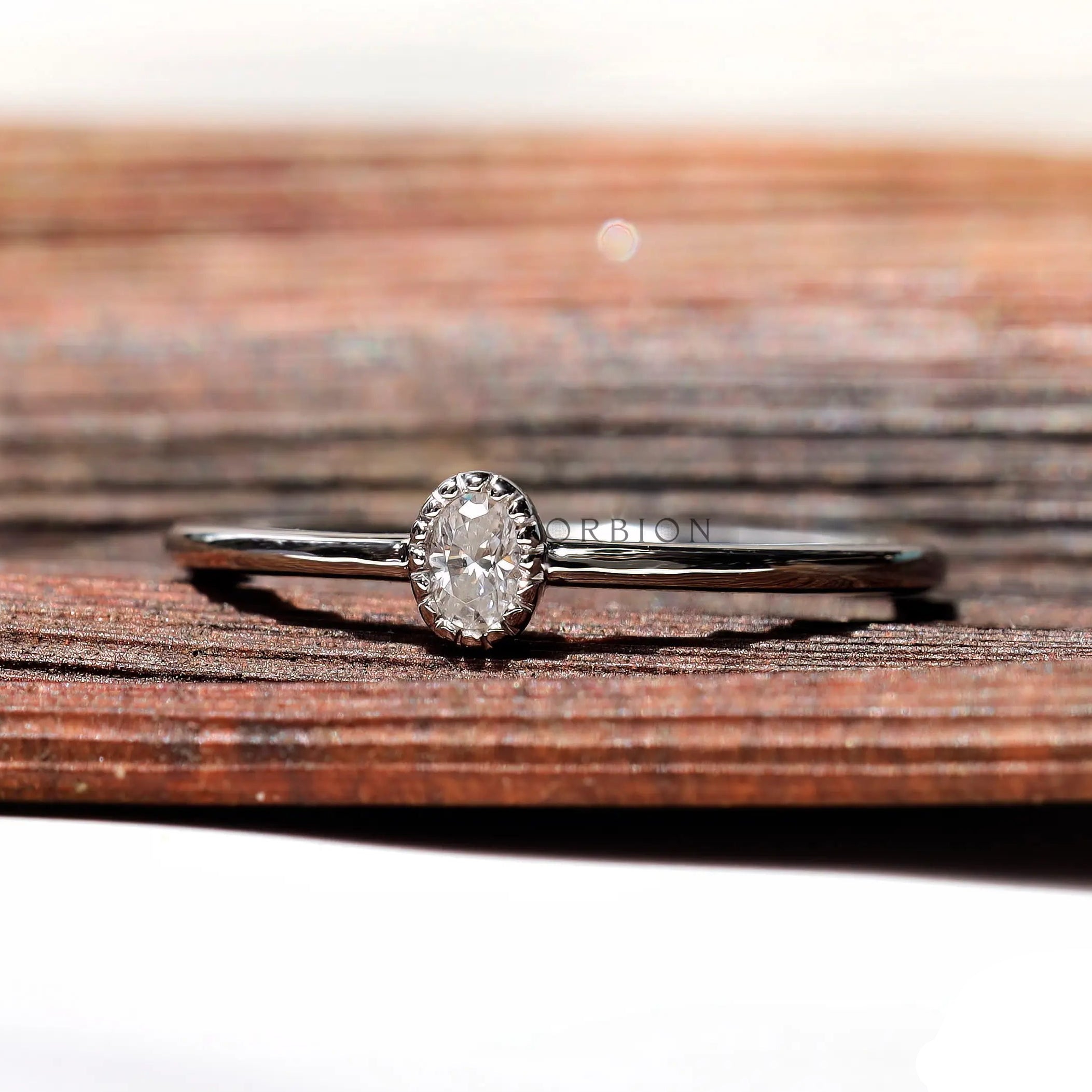 Oval dainty ring in 10K white gold minimal design top view