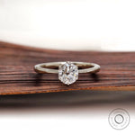 Elongated round old European cut lab grown diamond solitaire ring front view
