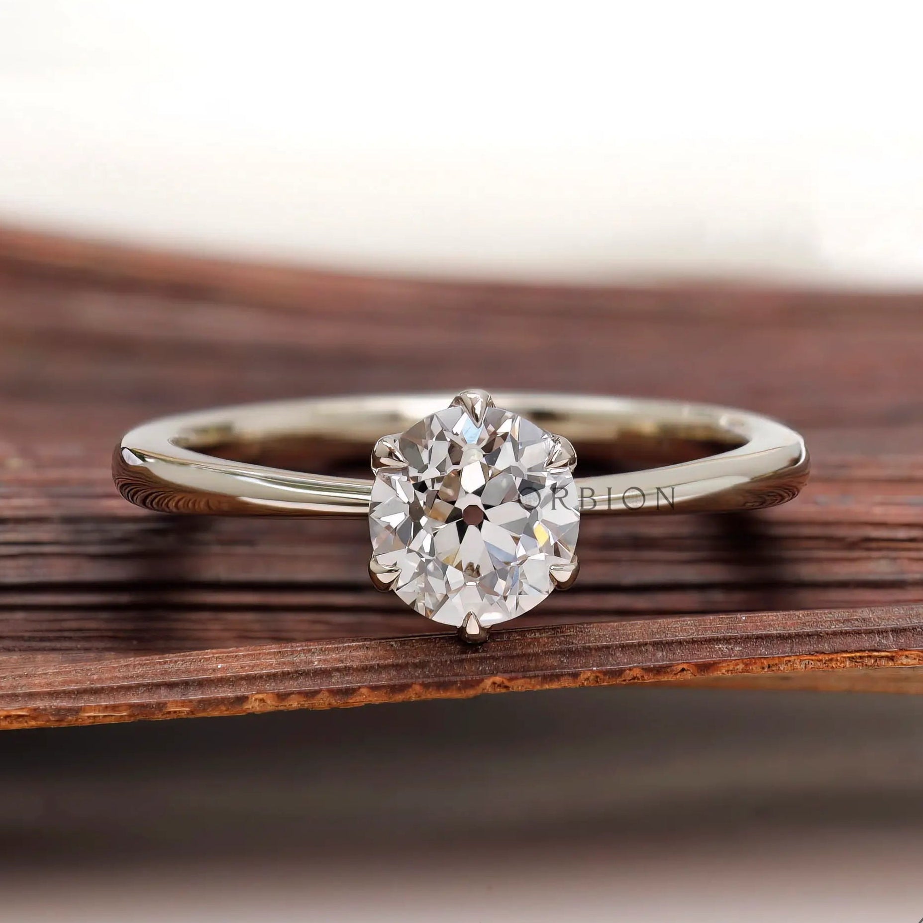 Elongated round old European cut lab grown diamond solitaire ring front view