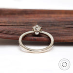 Rear gallery view of prong set elongated round diamond ring