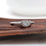 Oval old mine cut moissanite ring low profile half bezel setting