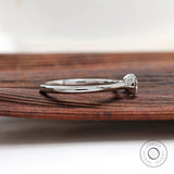 Oval half bezel set moissanite promise ring white gold band