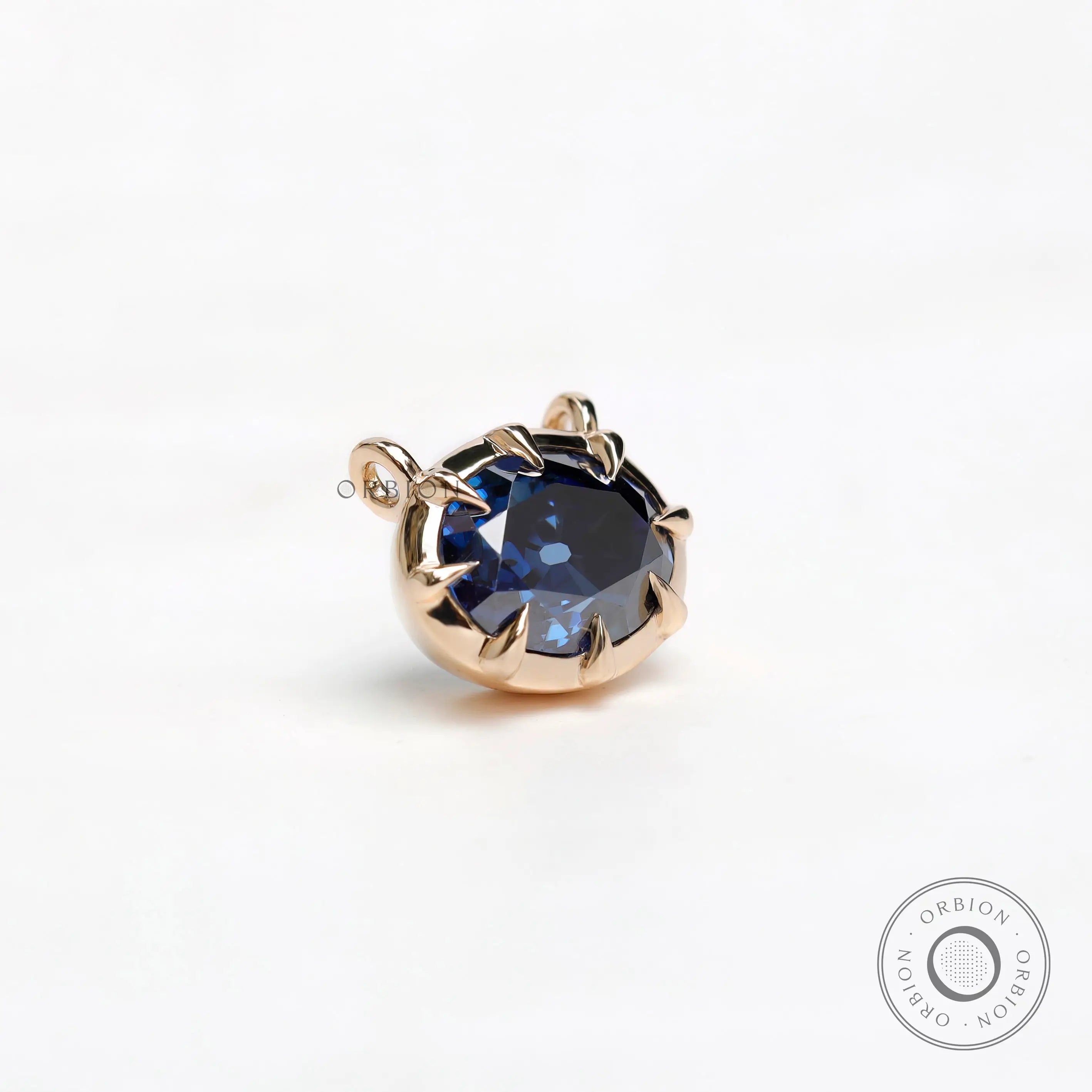 East west old mine cut blue moissanite pendant close up