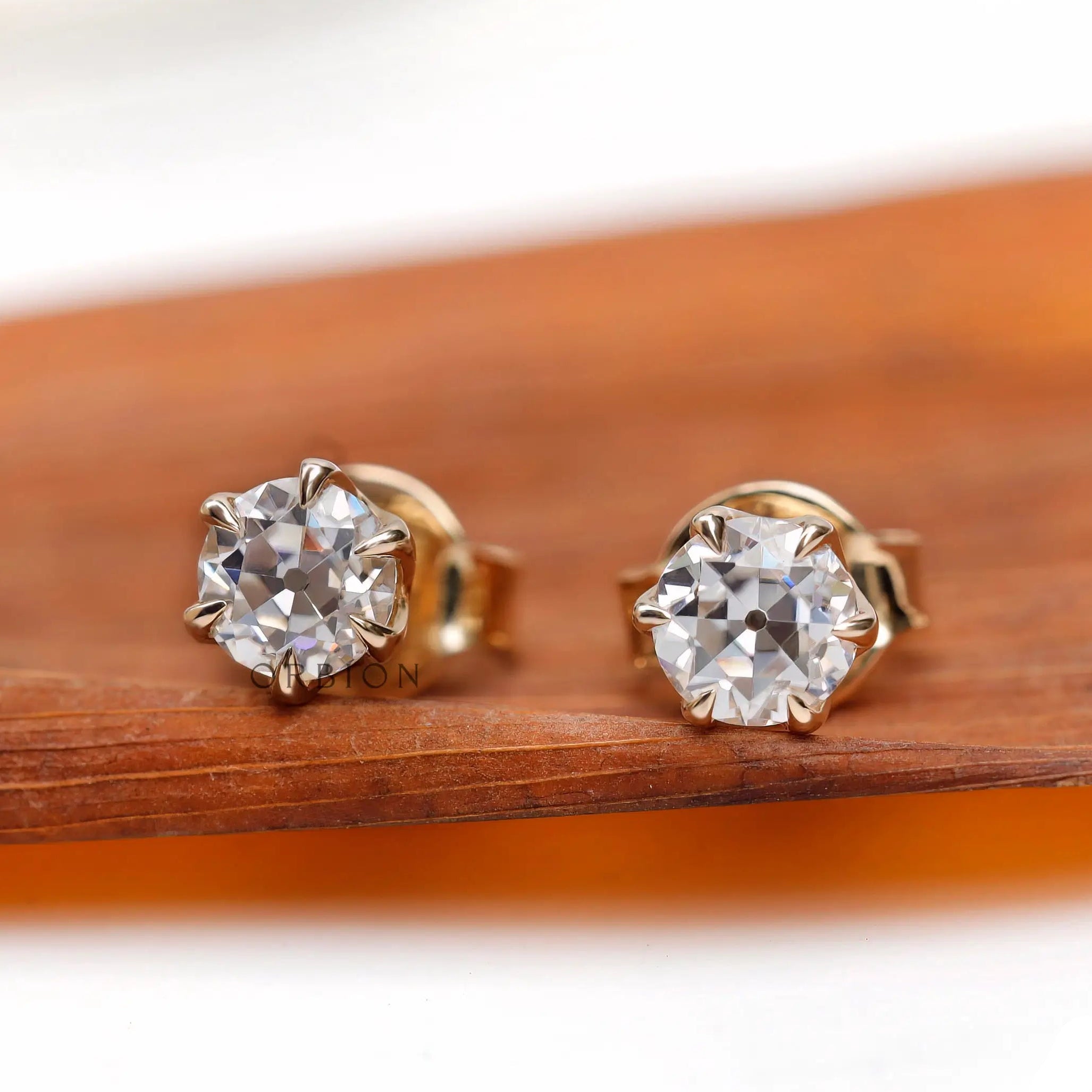 Round OEC moissanite stud earrings front display view