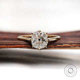 Elongated cushion old mine cut solitaire ring in 14k yellow gold front view