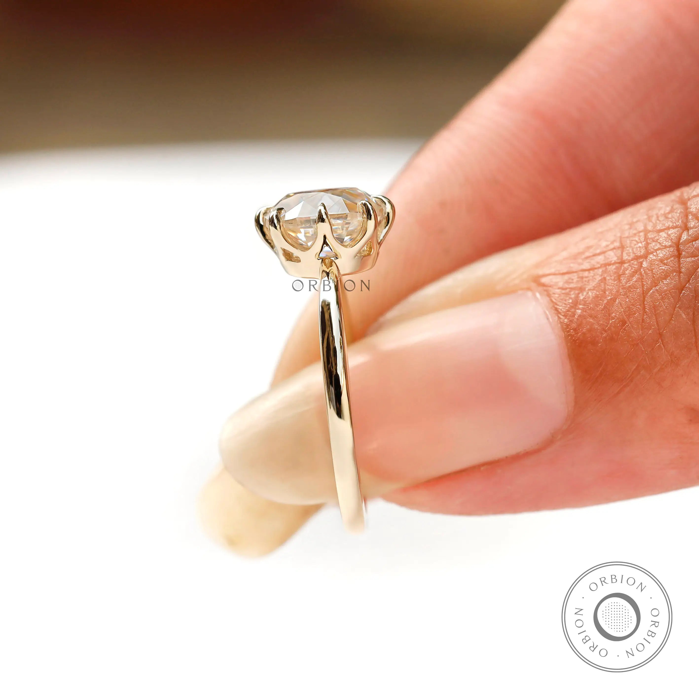 Minimal slim band solitaire ring in 14k yellow gold with elongated cushion center stone