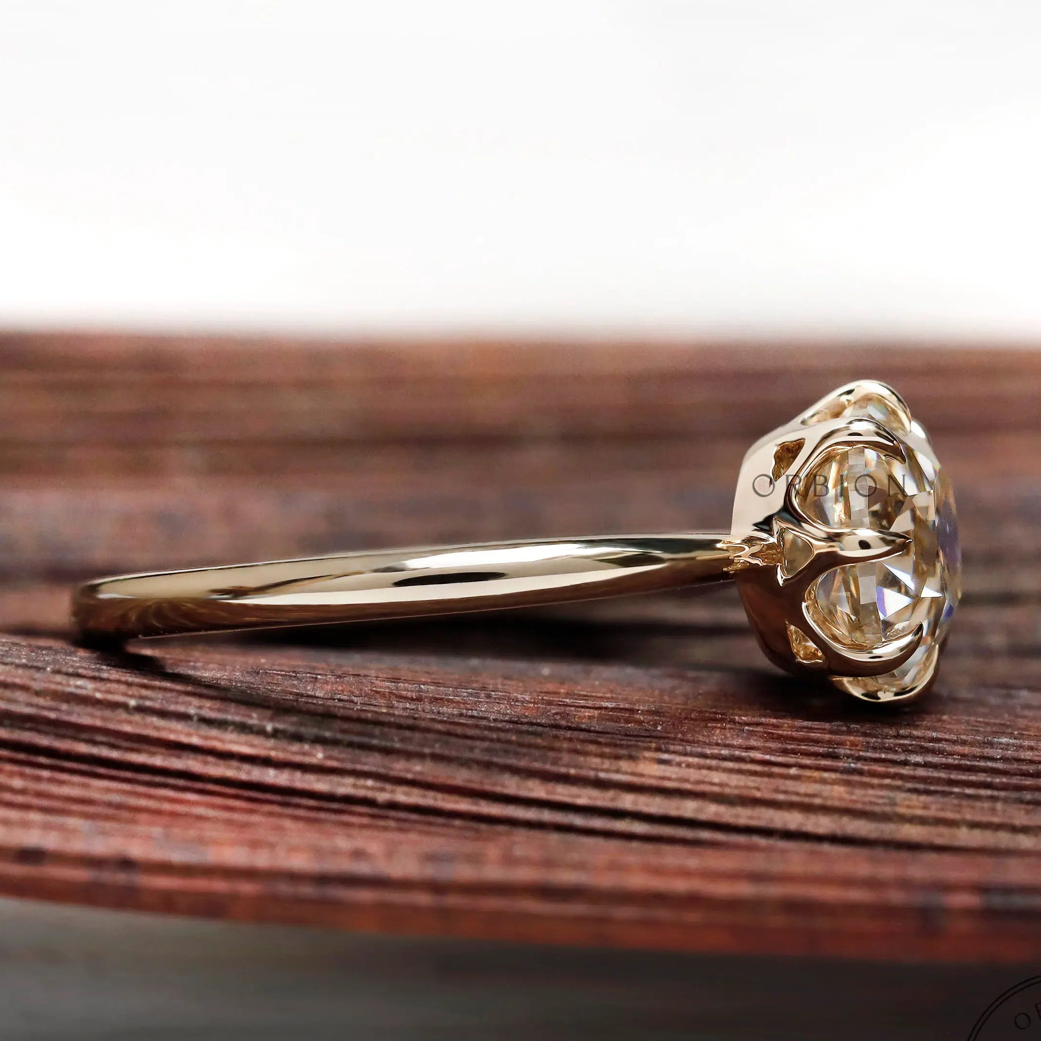 Stacking friendly solitaire ring in 14k yellow gold with antique style old mine cut brilliance