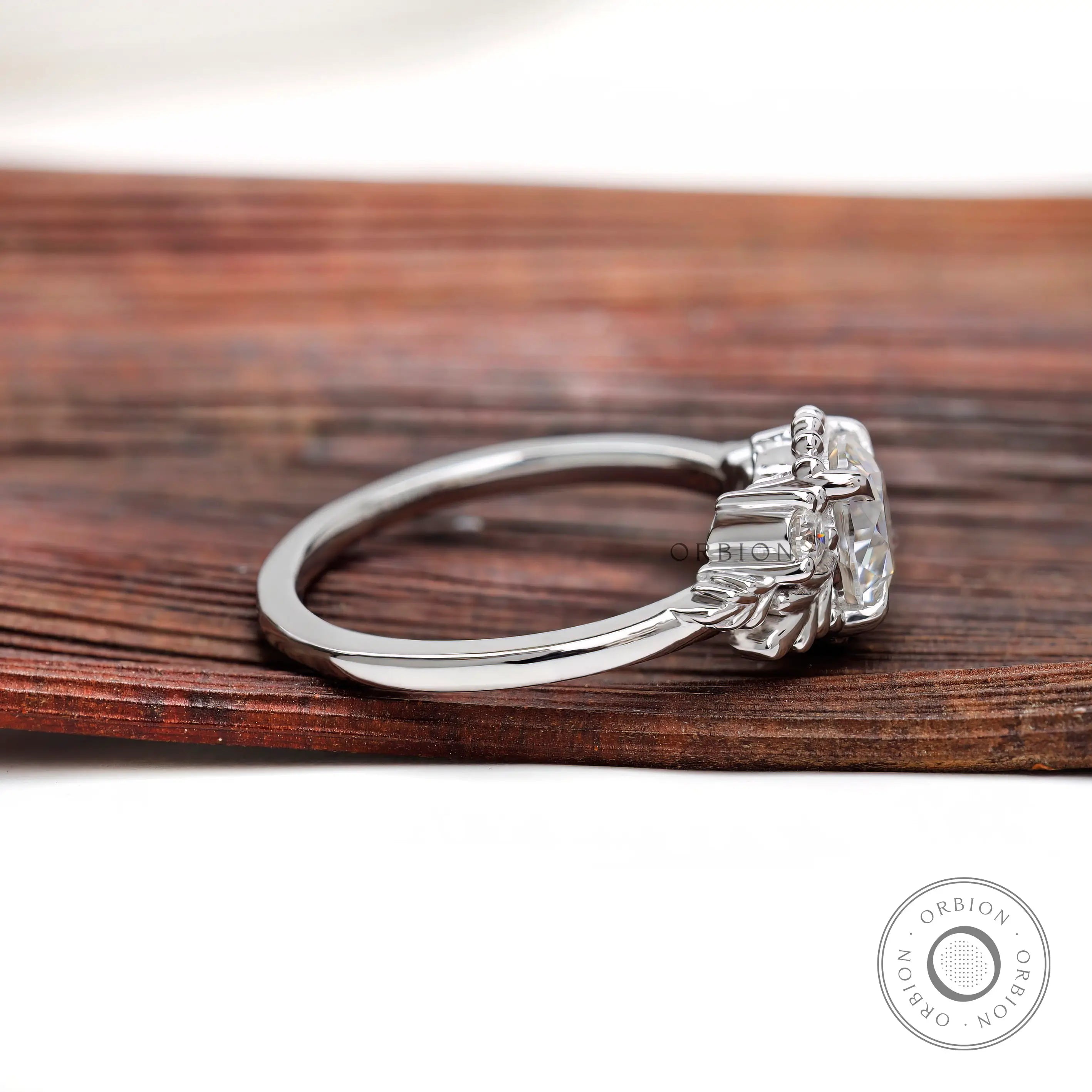 Leaf detail shoulder engagement ring in 10K white gold