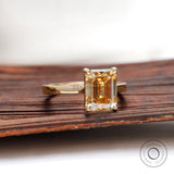 Side view emerald champagne moissanite ring 14k yellow gold