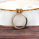 Cathedral shank handcrafted emerald cut champagne moissanite ring