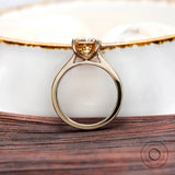 Cathedral shank handcrafted emerald cut champagne moissanite ring