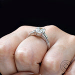 Vintage inspired Asscher engagement ring white gold on fingure