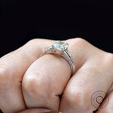 Vintage inspired Asscher engagement ring white gold on fingure