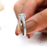 White gold Asscher cut engagement ring on hand