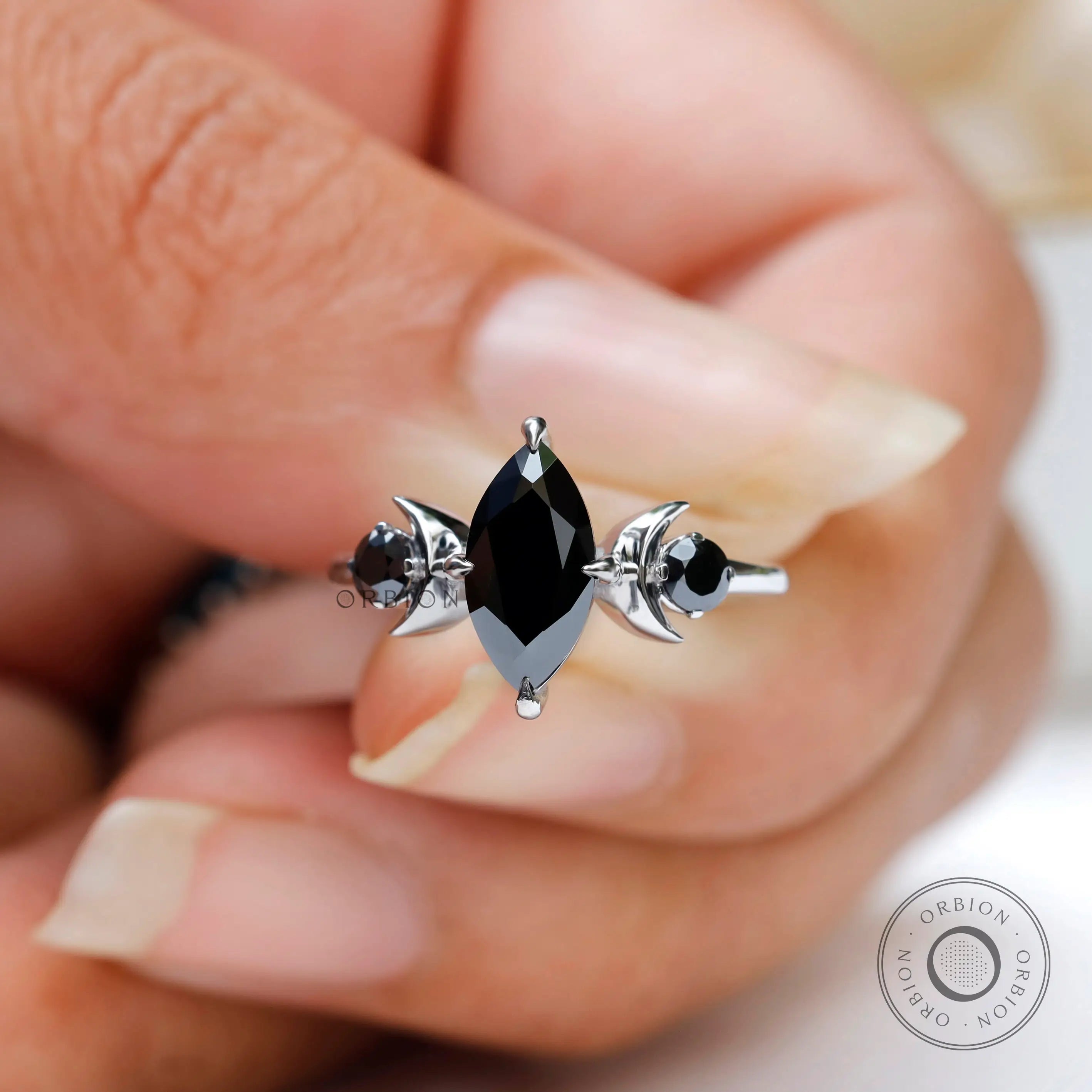 Black marquise moissanite crescent moon ring glossy finish detail