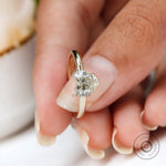 Macro front close up heart solitaire ring with blurred background