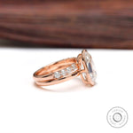 Side profile of bezel set moissanite ring in 10K rose gold