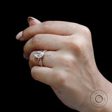 Close-up of Old Mine Cut moissanite center stone in bezel setting