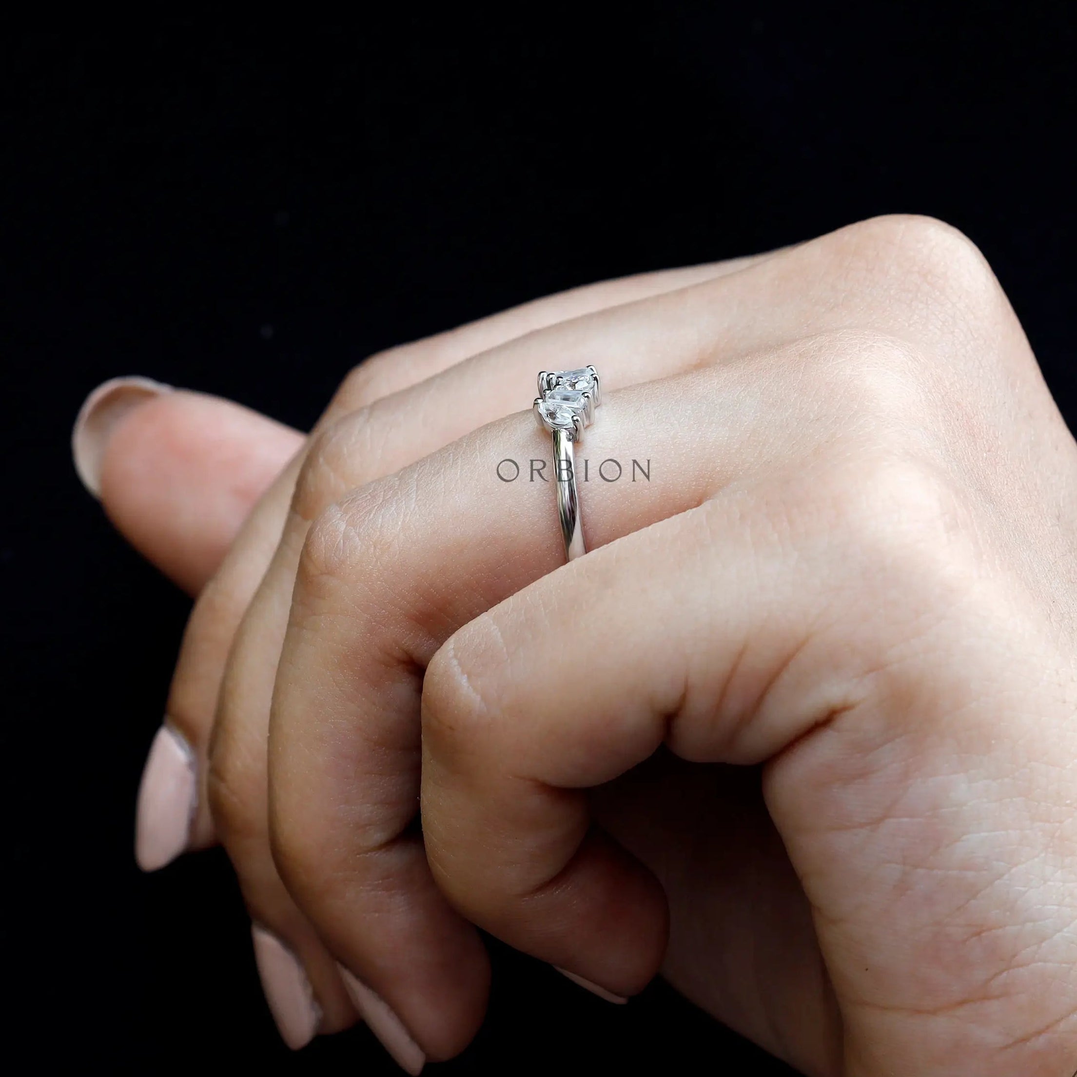 Macro view of mixed shape moissanite detailing