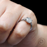 Close-up of center moissanite and  accent stones
