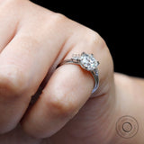 Close-up of center moissanite and  accent stones