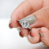 Angled view emphasizing milgrain and classic setting