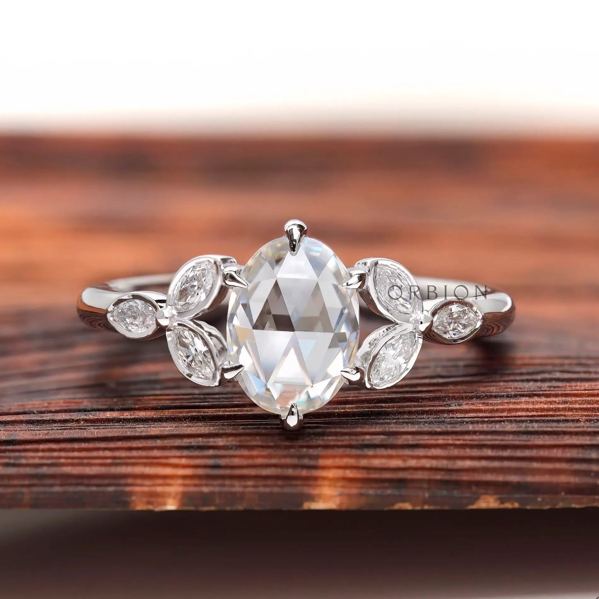 Front view oval rose cut moissanite cluster ring